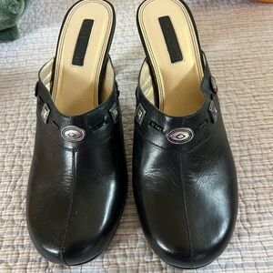 Unisa Black Slip-On Women's Mules with Decorative Medallions